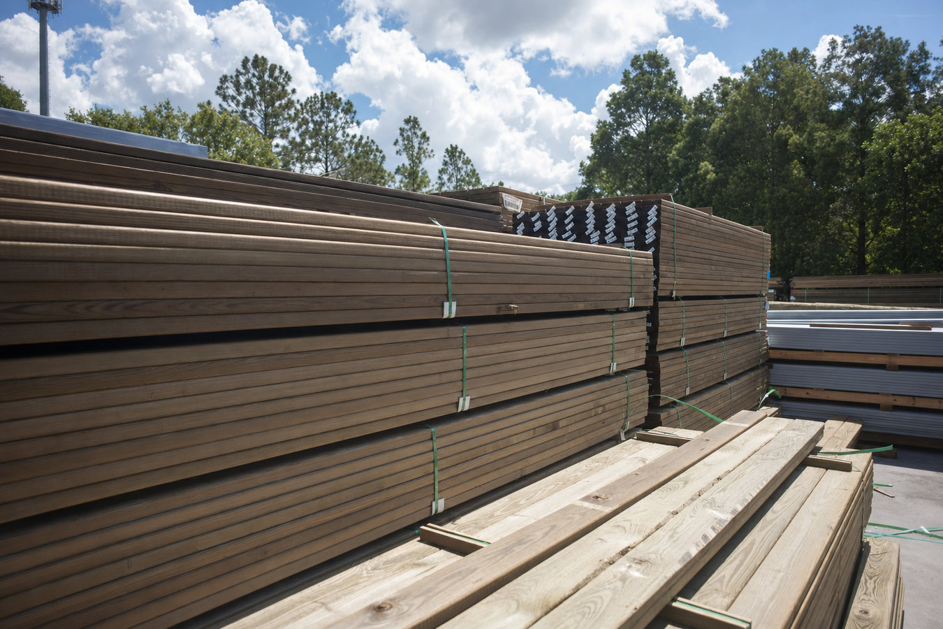 Pressure-treated wood deck construction